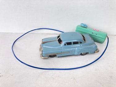 Vintage Cragstan Battery Operated Tin Toy Sedan Car