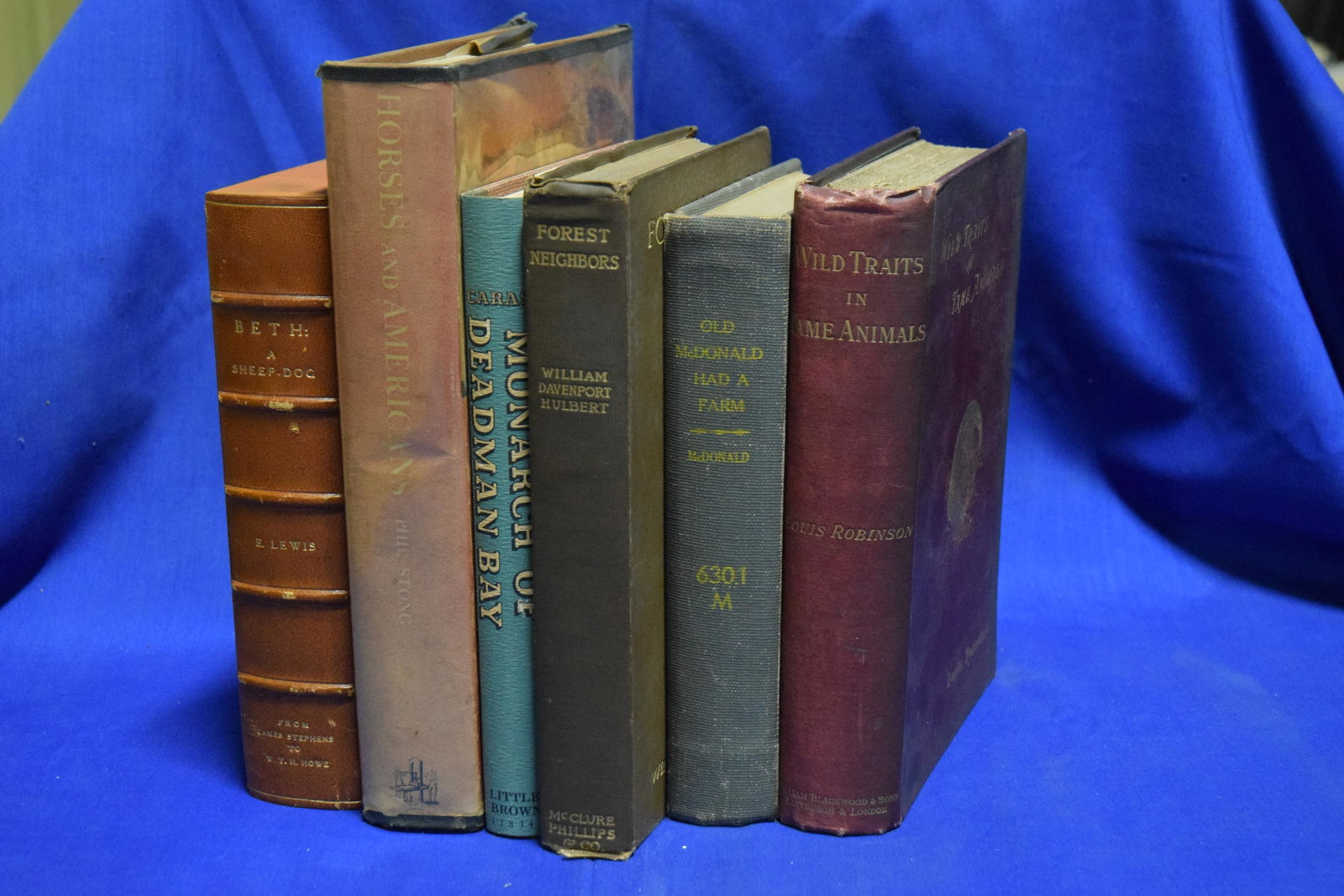 6 Books on Animals, Horses and Americans, Wild Traits in Tame Animals, Old McDonald had a Farm, Fore: Lewis, E., Caras, Roger, Hulbert, William D., McDonald, Angus, Robinson, Louis, Stong, Phil. All with cloth covers, gilt lettering. Some with dust jacket, BETH with case. Wild Traits in Animals 1897.