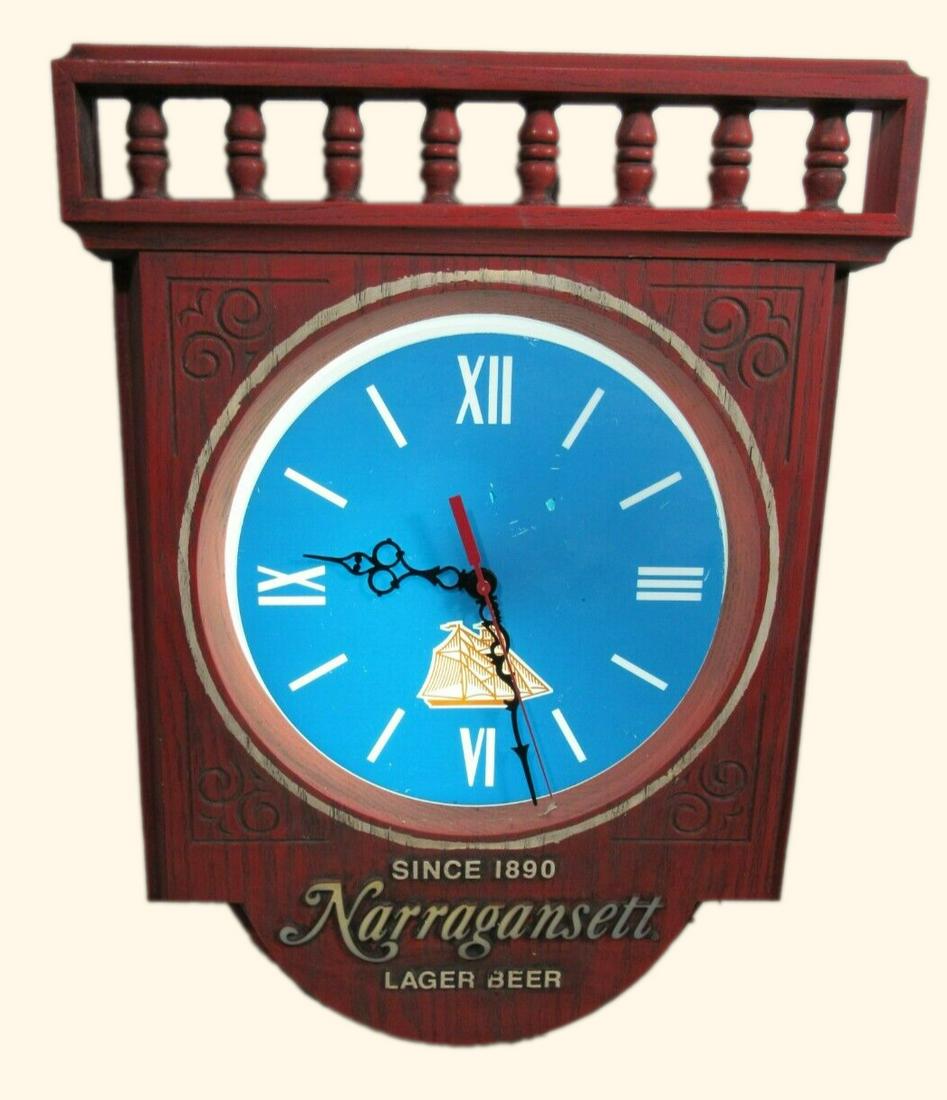 Retro Narragansett Illuminated Clock Signboard Ad: This is a vintage 1960s/70s Narragansett Beer lighted clock sign. It is made of plastic with a metal case and back, and measures 21"H x 15.5"W x 4.25"D (inches). It is a great piece for any vintage ad
