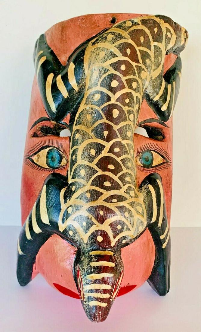 Vintage Mexican Traditional Art Wooden Wall Mask: Mexican Folk Art carved Nahua lizard head wall face mask is intricately detailed, hand-painted artwork from Guerrero, Mexico. A rare and highly collectible piece for any Mexican folk art collection, a