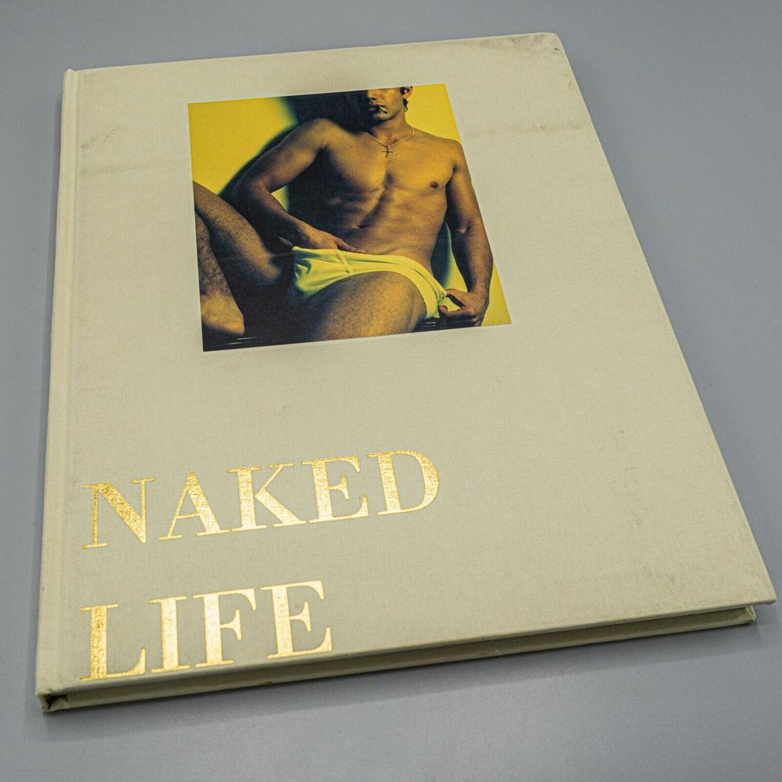 Hardcover Photography Book Bare Male Portraits Rare: The "Naked Life" hardcover book by Julian Hargreaves (2000). This book features stunning photography of nude men portraits. The hardcover measures approximately 12.1" x 9.9" (inches) and has 160 pages