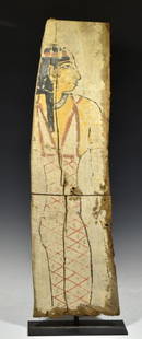 Ancient Egyptian Wood Panel with a Protective Goddess Isis: Late Period ca. 700 to 500 BCE. The long back board of the Sarcophagus, the inner panel well decorated in white ground with black, red and yellow pigment very well preserved. Depicted is the Goddess