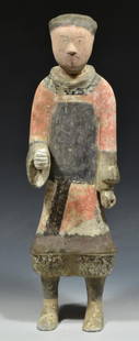 Huge Chinese Han Terra Cotta Soldier Figure 100 AD: Chinese Han Dynasty 206 BCE-220 AD. Polychrome terra cotta soldier figure, black, tan, and orange color with well delineated facial figures standing erect with one arm facing forward. Dimensions: 18-1