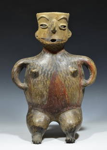 Pre Columbian Zacatecas Seated Female: Zacatecas, Mexico ca. 100 BCE - 250 AD. A large, hollow pottery figure having C-shaped arms held to her sides, pointed breasts. Perforated oval eyes and mouth, arched eyebrows and angular nose.