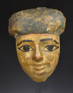 Ancient Egyptian Wood Sarcophagus Mask: Egyptianâ€“Late Period (664-332 BCE). Finely carved wood sarcophagus mask with serene facial features and extensive remains of original polychrome. Dimesions: 9 1/2" H. Provenance: Ex Explorer