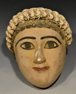 Roman-Egyptian Stucco Funerary Mask: Romano-Egptytian Period (ca. 1st Century AD). Stucco funerary mask, cast hollow-backed face, slightly smaller than life size, hand-modeled hair, neatly frames around face, overall original paint