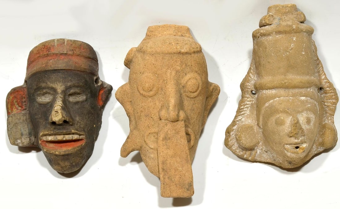 Mixtec Pottery Heads (3): Post Classic, Ca. 1200 to 1521 A.D. Expressive heads from figures; One with open mouth exposing a row of teeth painted in black, red and white pigment (ear spool missing). One in the form of a whistle