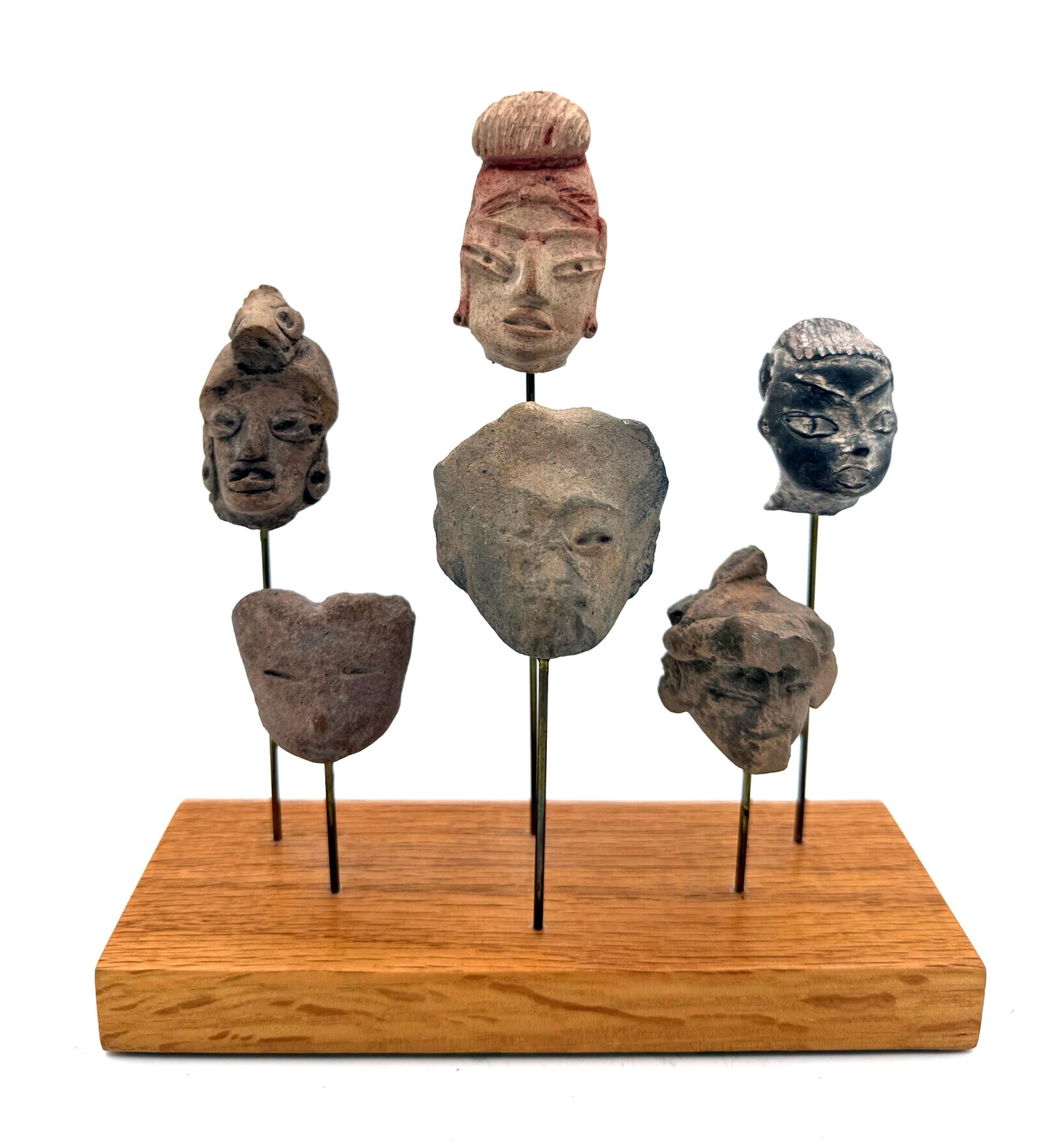 Pre-Columbian Mexican Pottery Heads (6): Tlatilco to Teotihuacan cultures.Sizes: 1.5 in H to 1.75 in H. + 0.75 H on custom base. Ex F Acev Florida Coll, Acq 1980s (Approx dims for shipping 6.5 x 5 x 7 in)