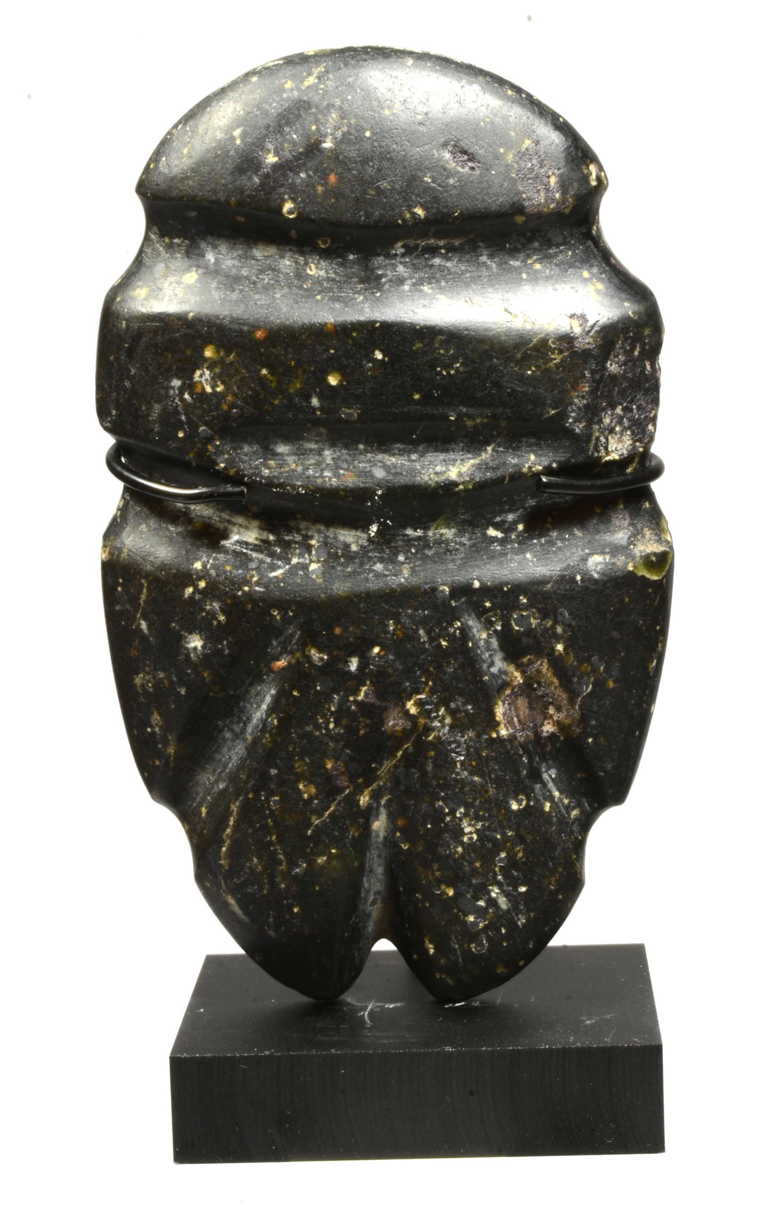 Mezcala Serpentine stone Axe God Figure: Mezcala Serpentine stone Axe God Figure. Guerrero, Mexico. Ca. 100 BC. to 250 AD. , A beautiful highly abstracted flecked green stone rendered with the most minimal cut outs to suggest the figural for