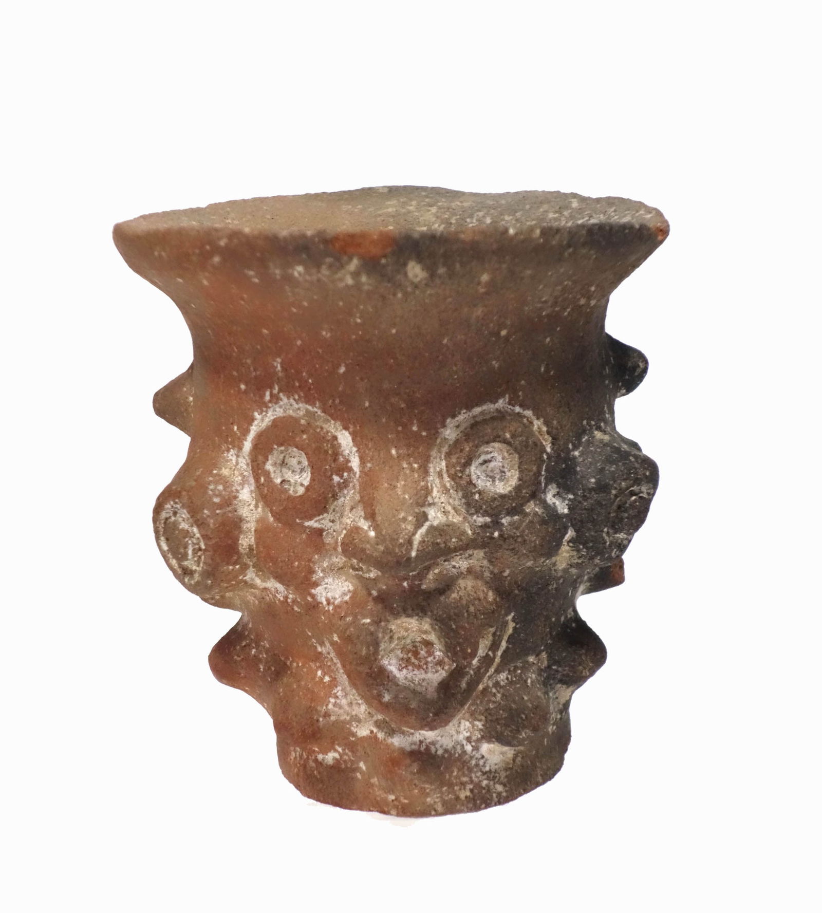 Aztec Tloloc Pottery Censor: Aztec Tloloc Pottery Censor. Post Classic Period, Circa 900-1450 AD, Buff clay rounded cup or kero with the goggle eyed deity of the rain and sky depicted. Intact (has a rim flake). overall in deep re