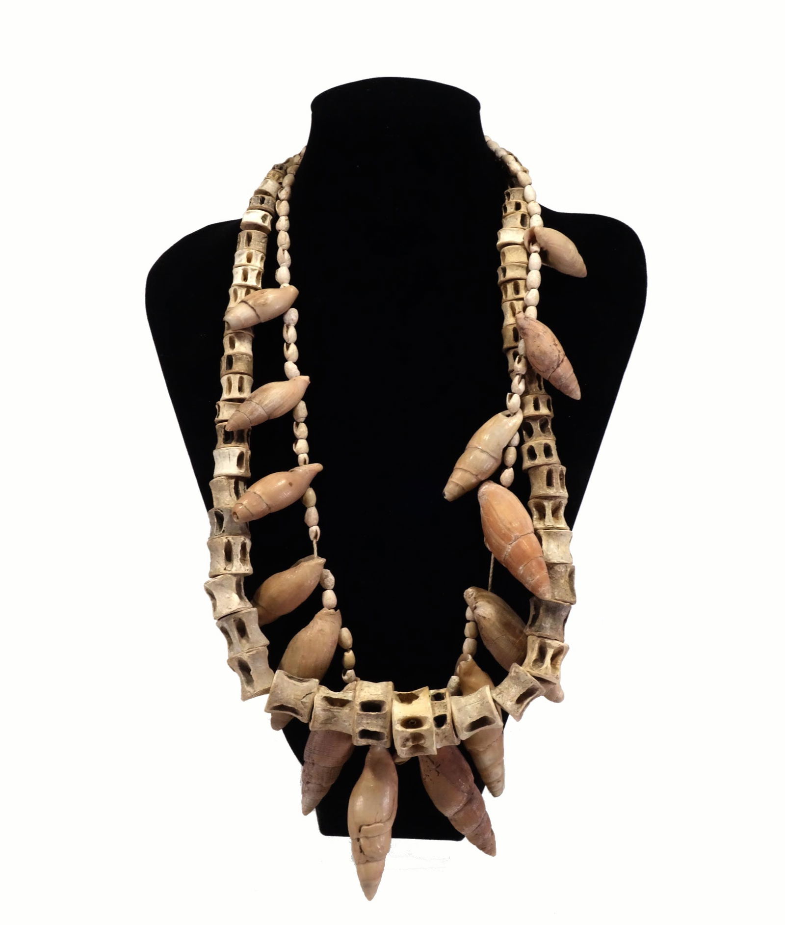 Zapotec Bone and shell Bead Necklaces (2): Zapotec Bone and shell Bead Necklaces (2). Central America, Ca. 500 to 1000 AD., One comprised of barrel shape beads with open pinwheel shaped beads. The other with small beads interspersed with longe