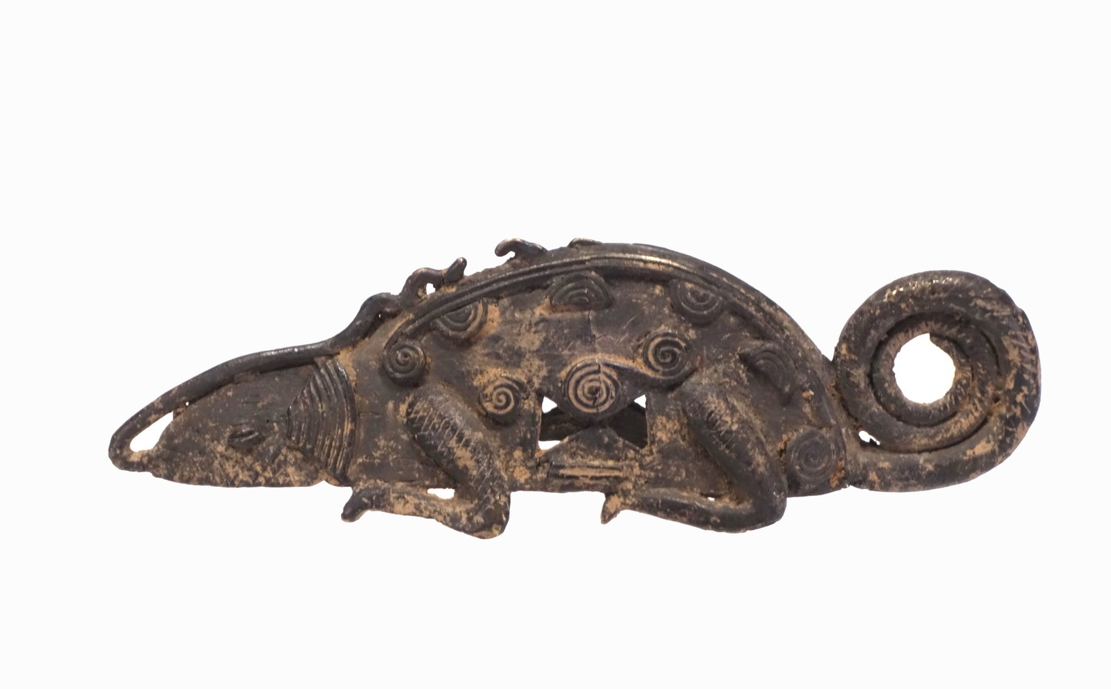 Dogon Bronze Lizard: Dogon Bronze Lizard of good casting and use and age from Mali, or somewhere in Western Africa, A cast and chased animal of compact form with central raised ridge and curled tail with decorative swirls