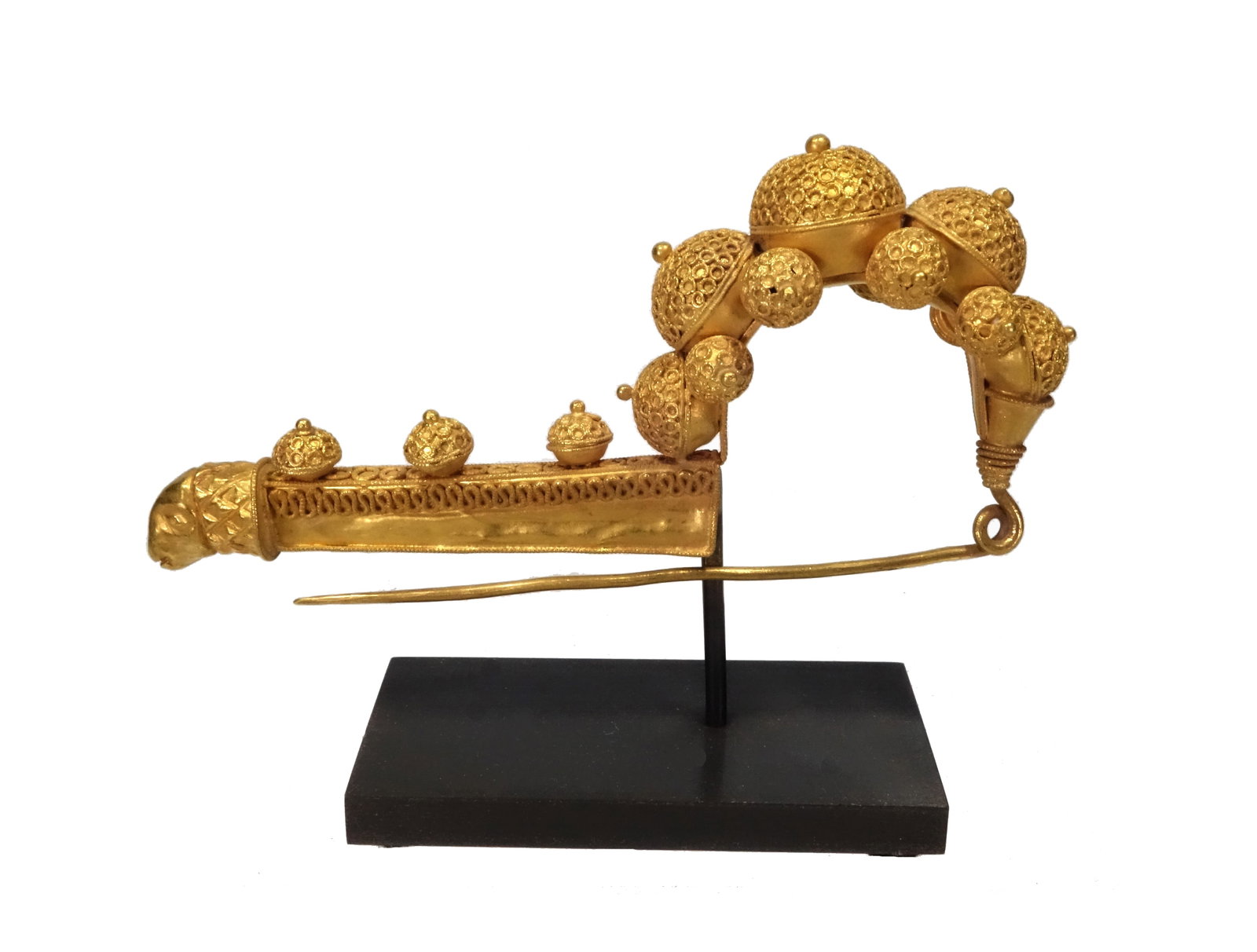 Fabulous Etruscan Revival Gold Fibula Attributed to Giacinto Melillo: Etruscan Revival Gold Fibula. Attributed to Giacinto Melillo, Italian 1846 - 1915, A large pin inspired from antiquity with arched bow and channel shape catch plate. Filigree carved open fretwork and 