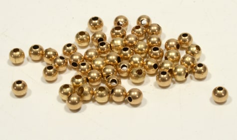 Fifty 3mm hollow 14K gold beads
