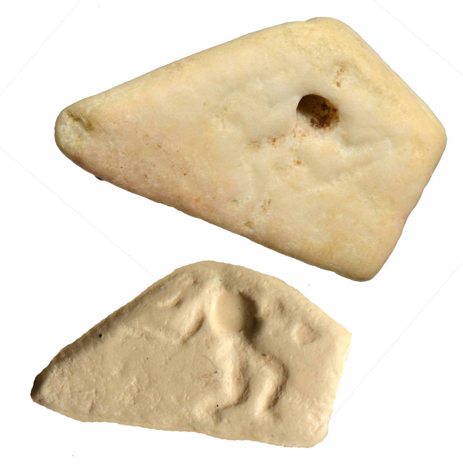 Ancient Near Eastern Mesopotamian Marble Amuletic Stamp Seal Pendant: 2nd Millennium BC. Tapered three dimensional almost animal like shape, worn, pierced for suspension and carved on every side with geometric and zoomorphic devices. Size 1-7/8 inches (4.7cm) L. Intact 