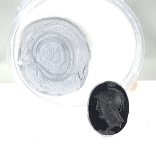 Ancient or Antique Black Stone Intaglio with Trophy of Arms