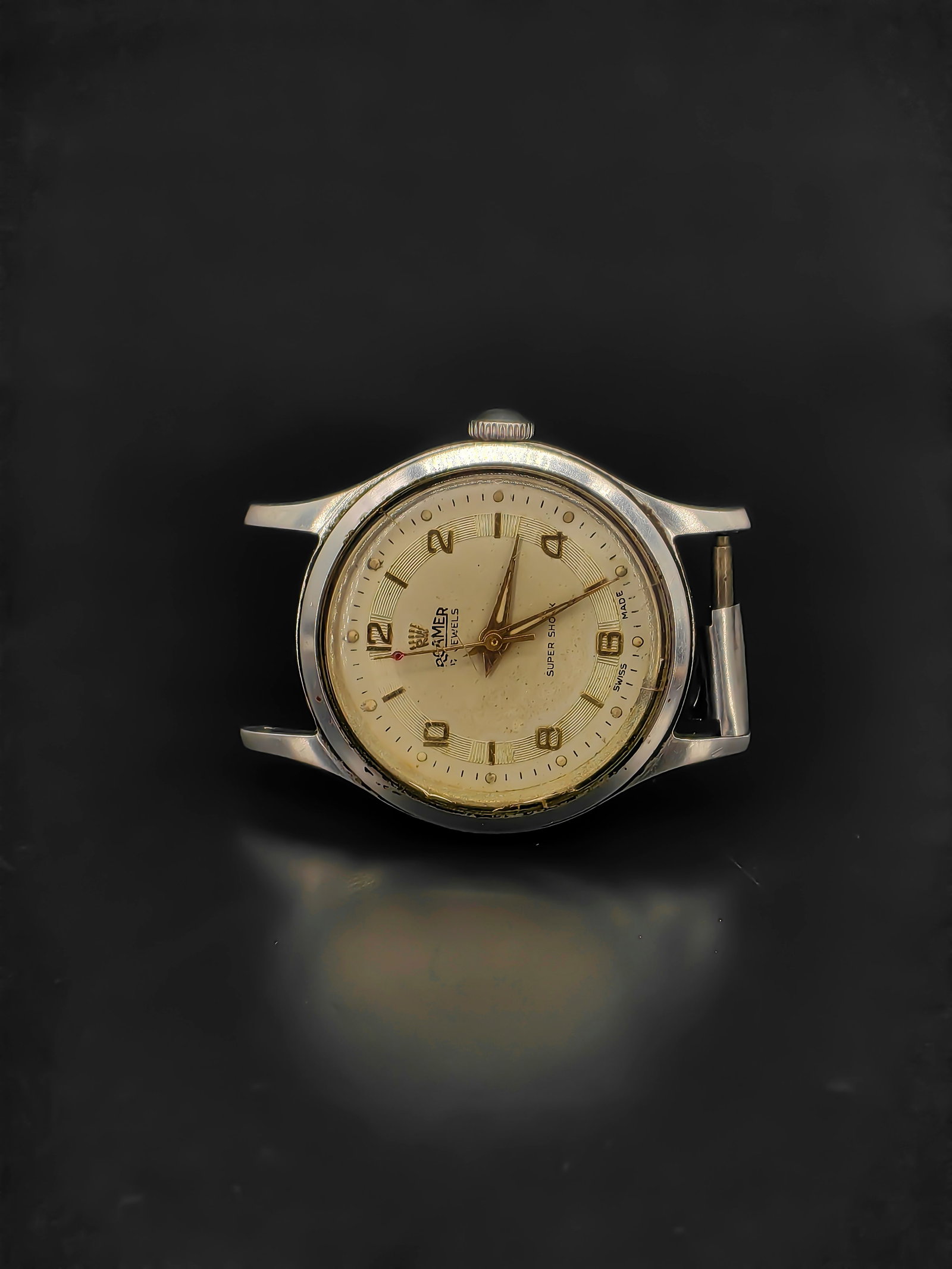 An Vintage Swiss Watch: Antique Roamer Swiss wristwatch, mid-20th century. Stainless steel waterproof case marked “Roamer Brevete” with Swiss cross and serial numbers to the back. The dial is signed Roamer 17 Jewels