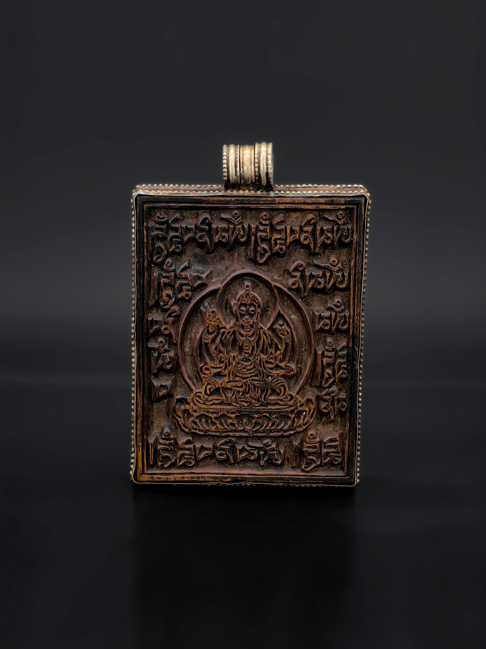 An Ancient Tibetan Buddhist Amulet Pendant (1 of 7)
