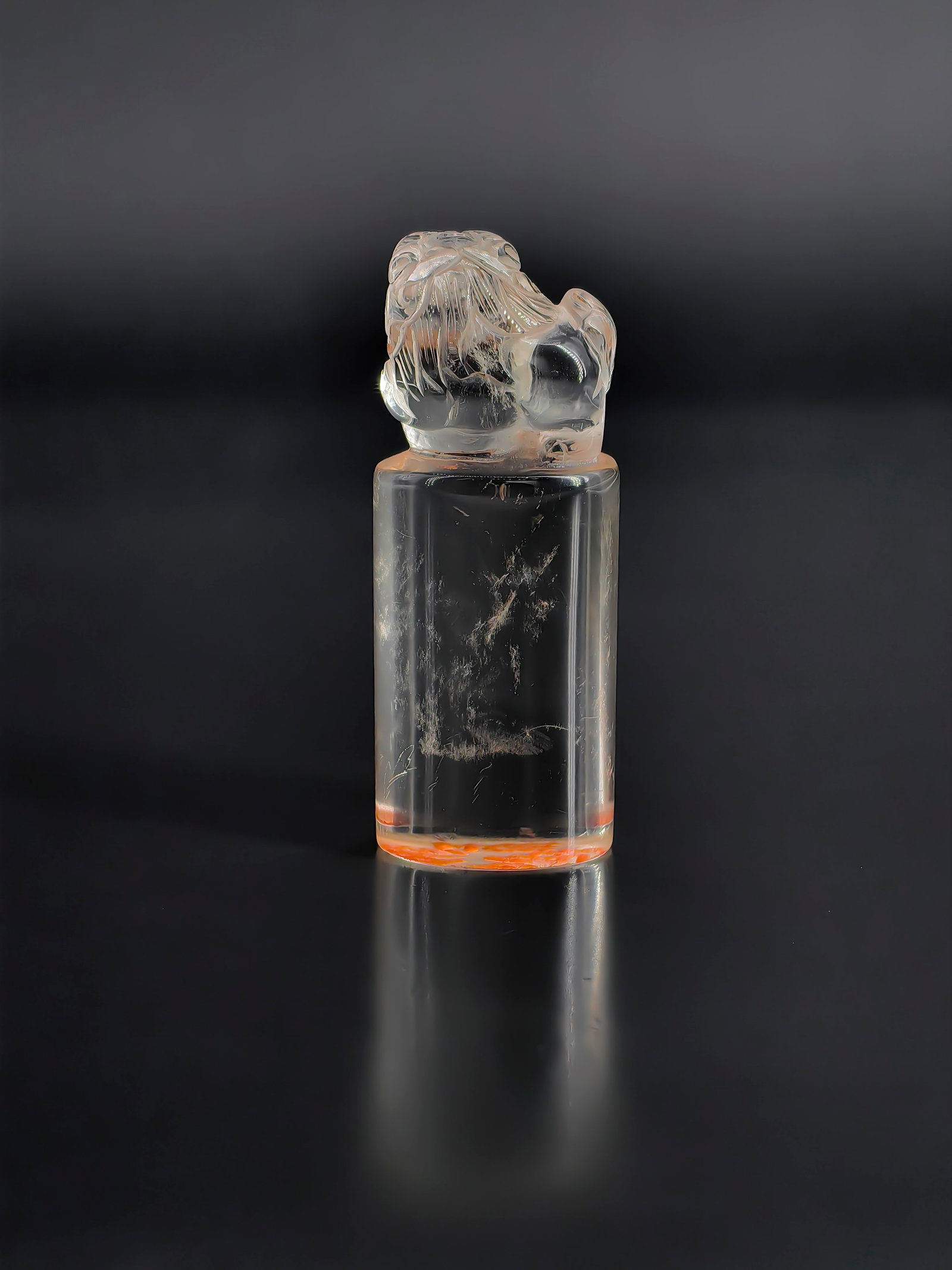 A Crystal Seal, Republican Period: This is an exquisite crystal seal from the Republican Period. The cylindrical body stands at approximately 11.5 cm tall. It is transparent with natural hair-like inclusions inside. The knob is finely