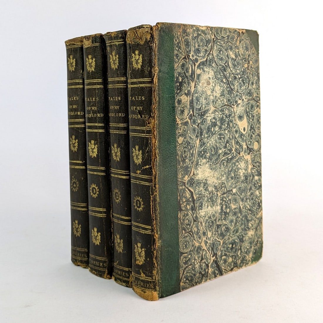 Tales of My Landlord 1st Series, 1816: Jedediah Cleishbotham [Sir Walter Scott] Tales of My Landlord First Series (4 Volumes) Edinburgh: William Blackwood and John Murray, 1816.First Edition.18cm x 10.5cm. 4 volumes. Half leather, marbled