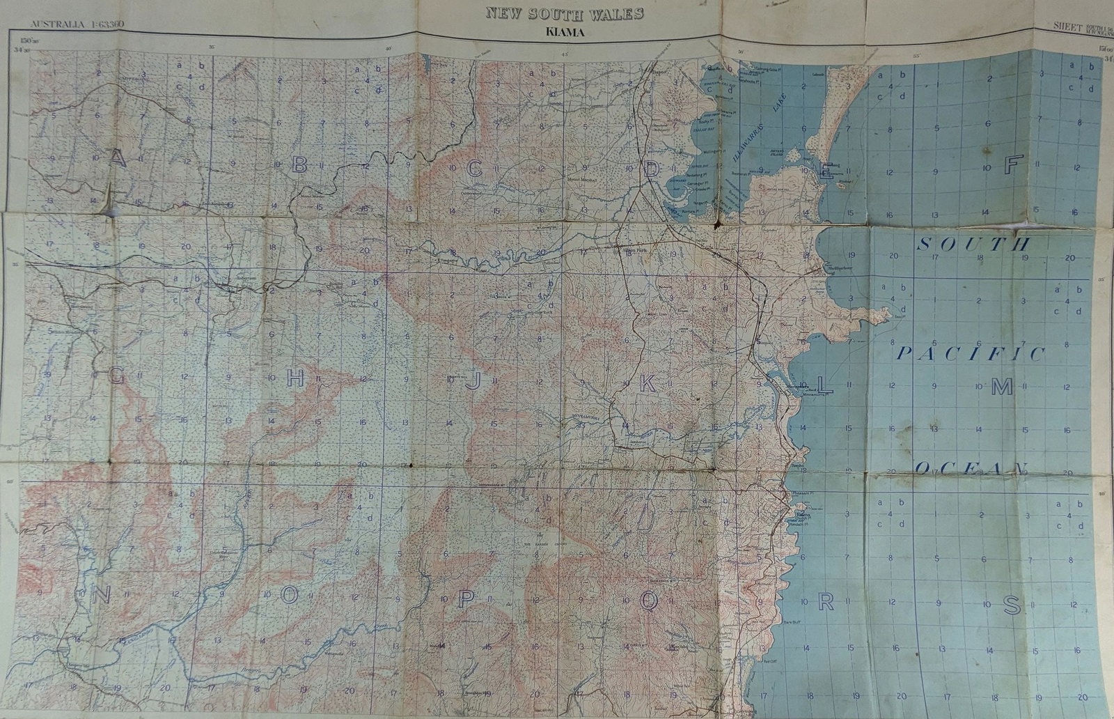 Kiama. Military Survey of Australia 1932: Kiama (New South Wales). Military Survey of Australia Melbourne: Department of Defence, 1932. 43cm x 72cm. Lithographed map, laid on linen. Some soiling and foxing. Some splitting along top horizontal