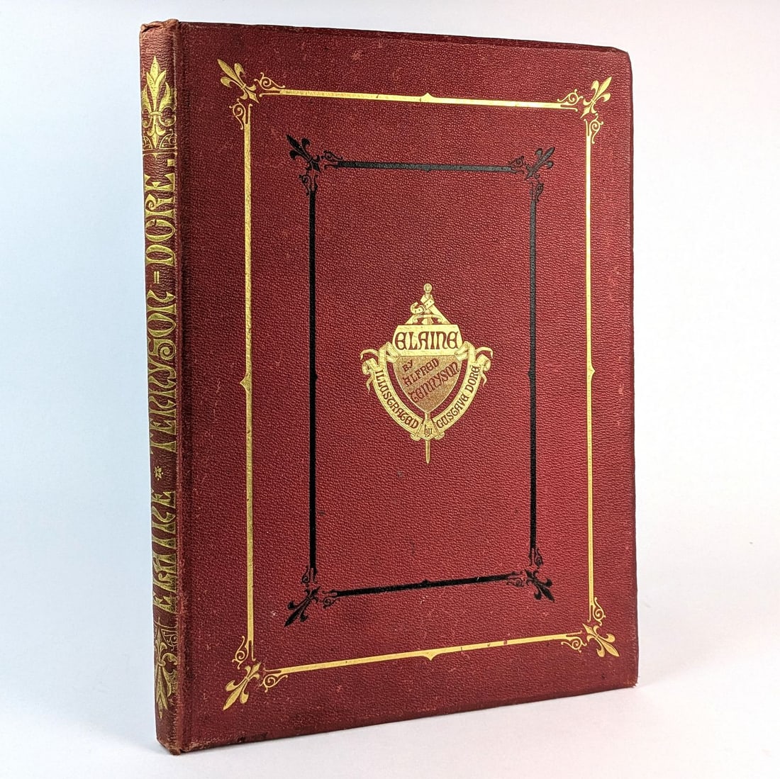 [ART] Dore; Tennyson: Elaine: Alfred Tennyson: Gustave Dore Elaine London: Edward Moxon & Co., 1867.43cm x 31cm. [vi], 84 pages, 9 plates. Original red cloth, gilt lettering and decoration. Tennyson's poetic telling of the Arthuri