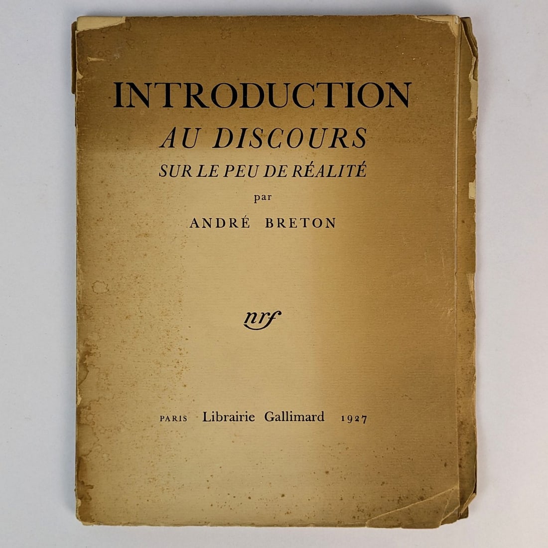 [SURREALISM] Andre Breton: Introduction au Discours: Andre Breton Introduction au Discours sur le pue de realite Paris: Librairie Gallimard, 1927.First Edition.25cm x 20cm. 40, [1] pages, frontispiece. Lettered wrappers. Text is in French. [Introduct