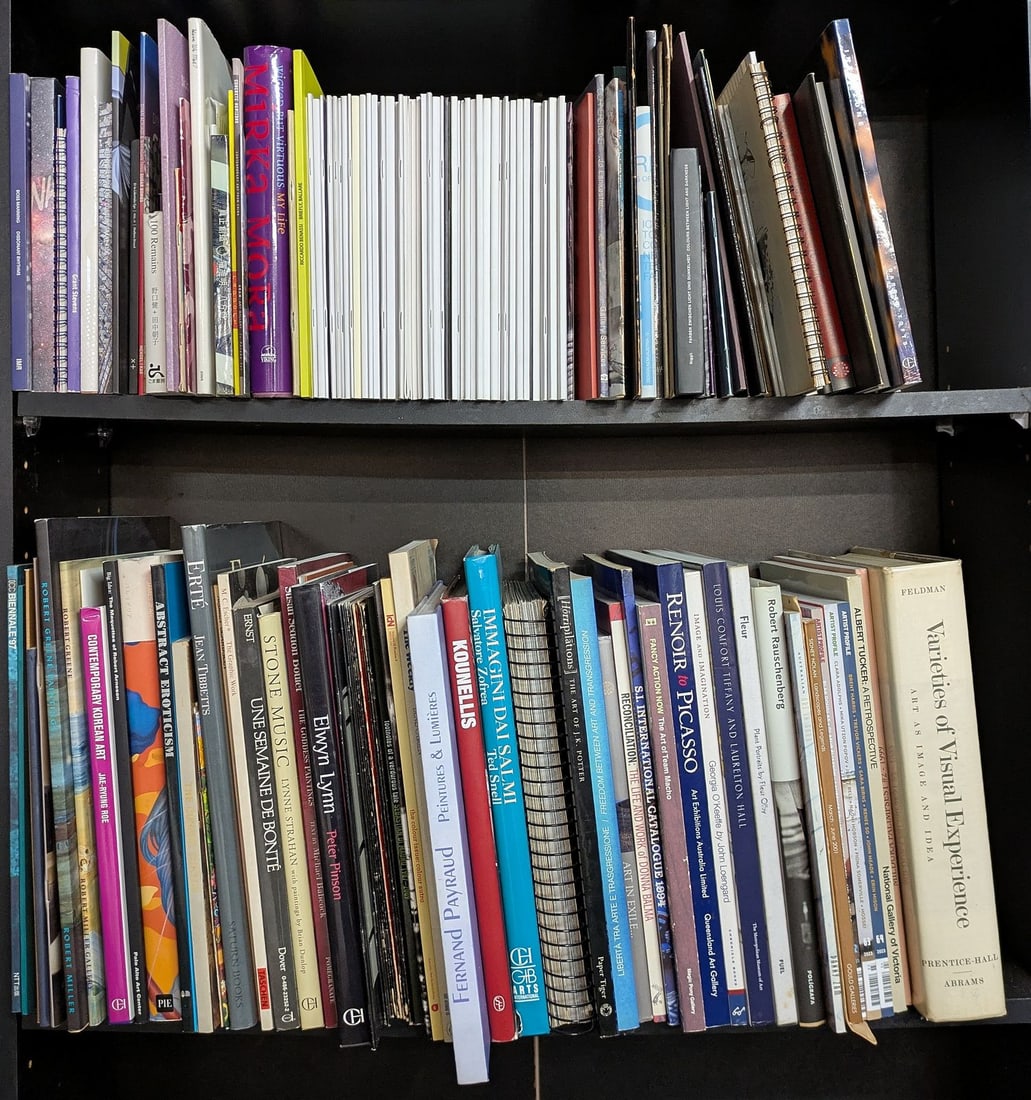 Art: 2 shelves of art books. Includes James Jean, Max Ernst, M. C. Escher, Erte, Mirka Mora, and many others. Mix of monographs and catalogues.