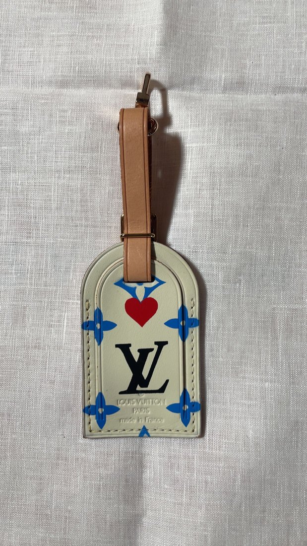 Louis Vuitton Luggage Tag: Authentic cute Louis Vuitton multicolor Luggage Tag. A stylish yet simple way to tag your luggage. Condition; New/unused
