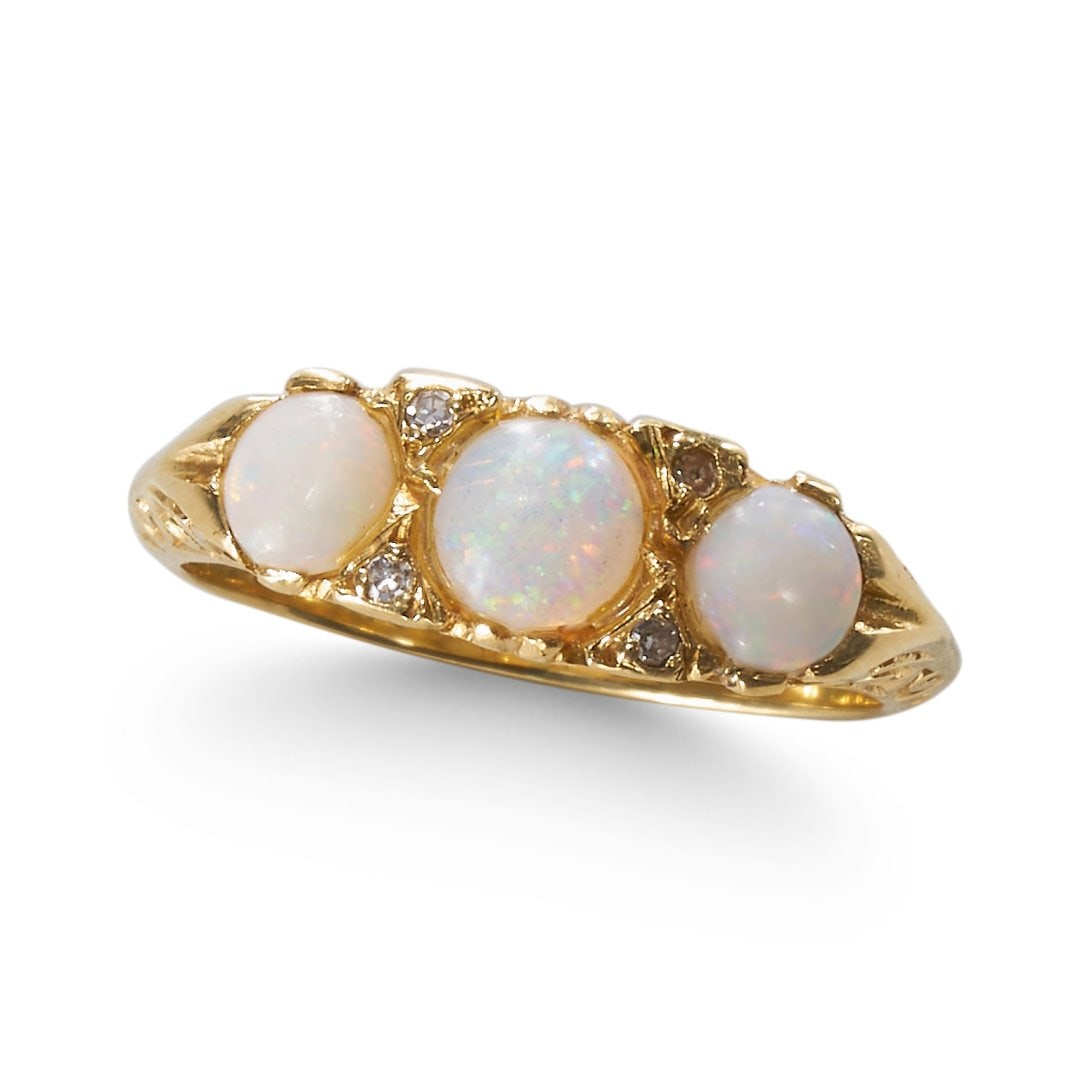 AN OPAL AND DIAMOND SEVEN STONE RING. (1 of 1)