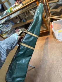 4 hand gun carrying cases & 1 rifle case
