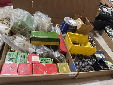 2 boxes misc brass n bullets