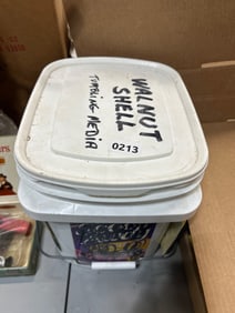 Bucket of Walnut Shell Tumbling Media