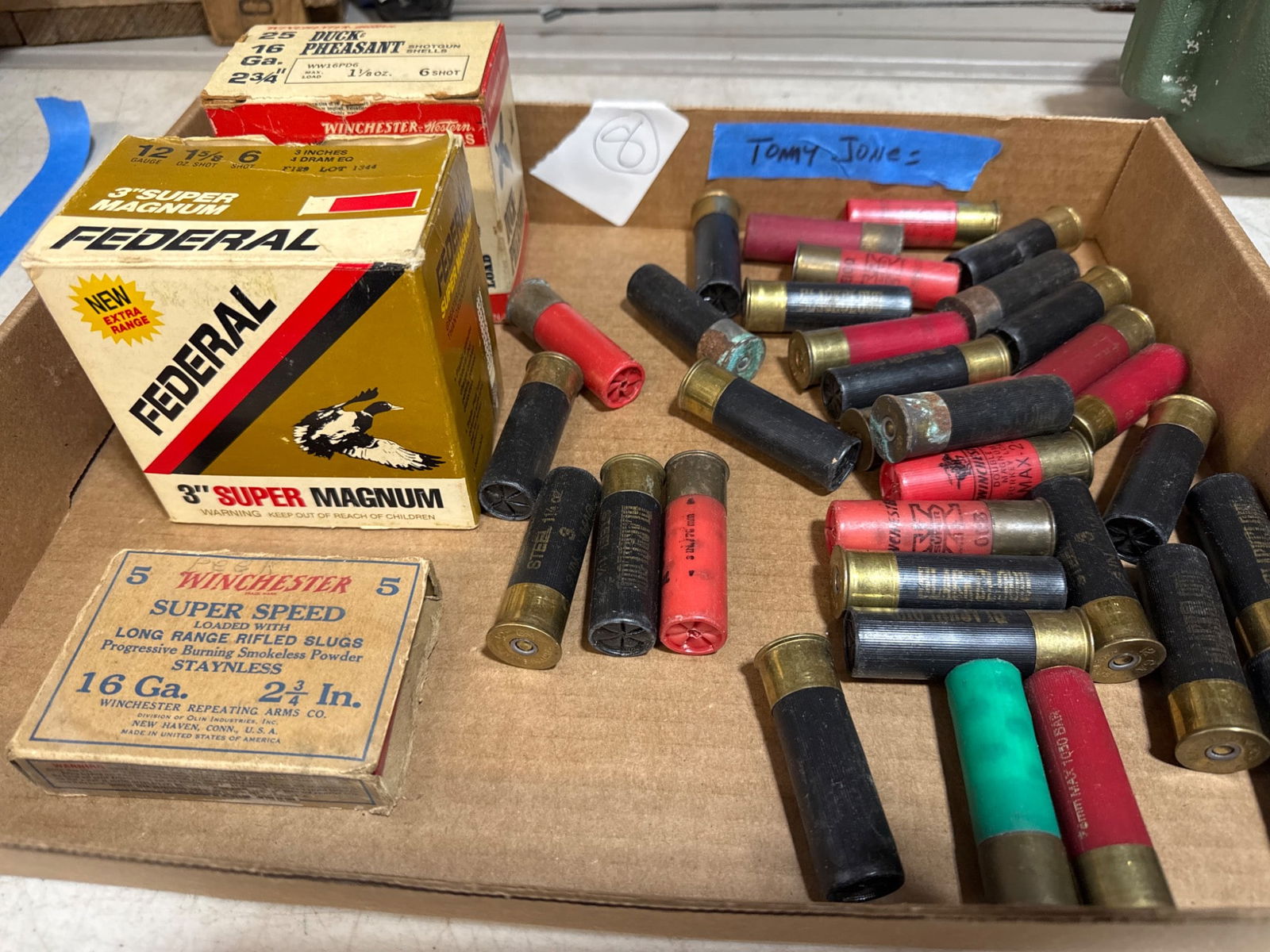 Shotgun Ammunition Assortment: Shotgun ammunition, featuring boxes from Winchester and Federal with 16 and 12 gauge rounds. Condition varies. All items are sold AS IS, WHERE IS with no warranties or guarantees of any kind; all sale