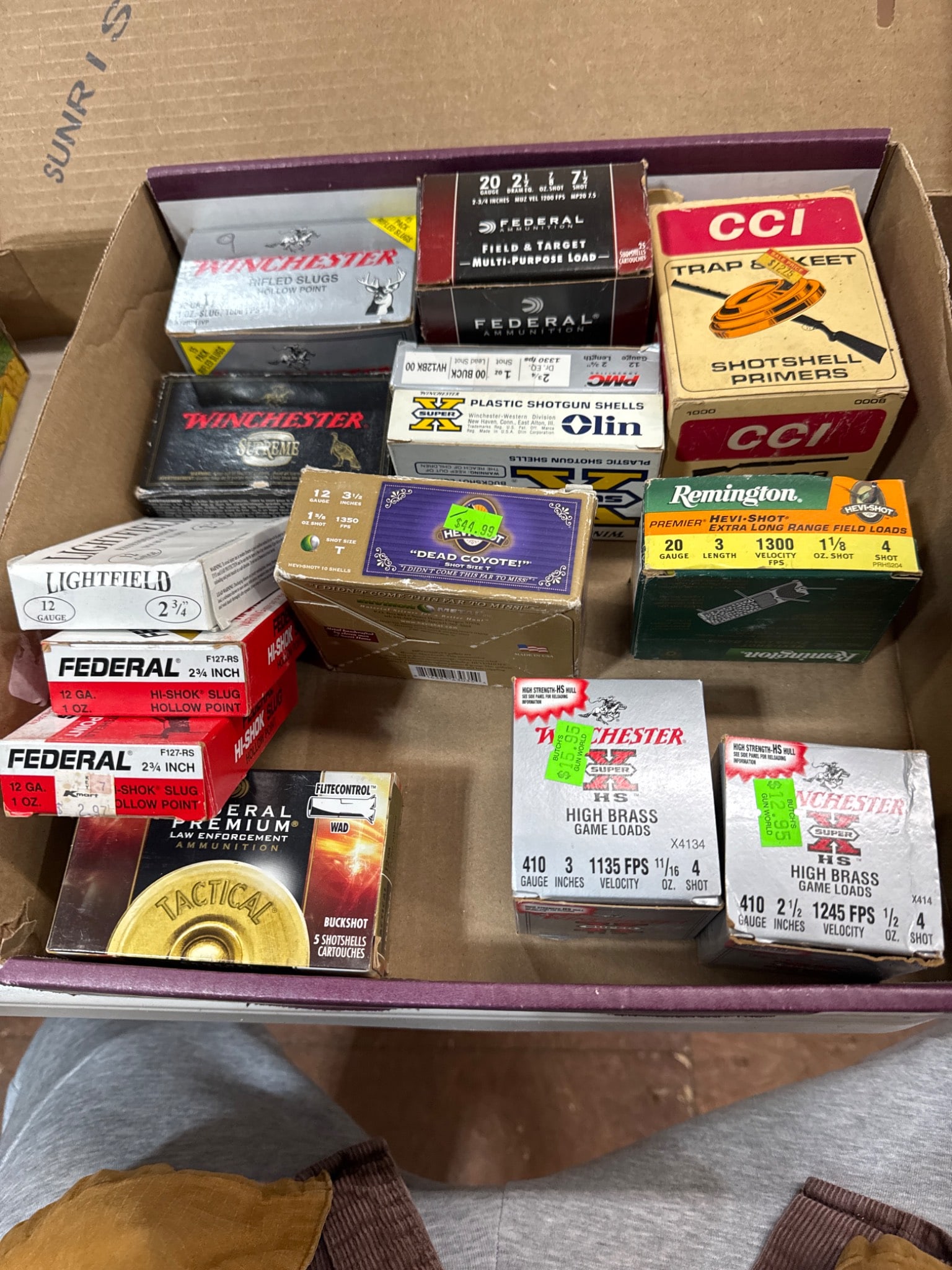 Shotgun Ammo Mixed Lot: A variety of shotgun ammunition from brands such as Winchester, Federal, Remington, and CCI. Mixed gauges and loads, including slugs, field loads, and buckshot. All items are sold AS IS, WHERE IS with