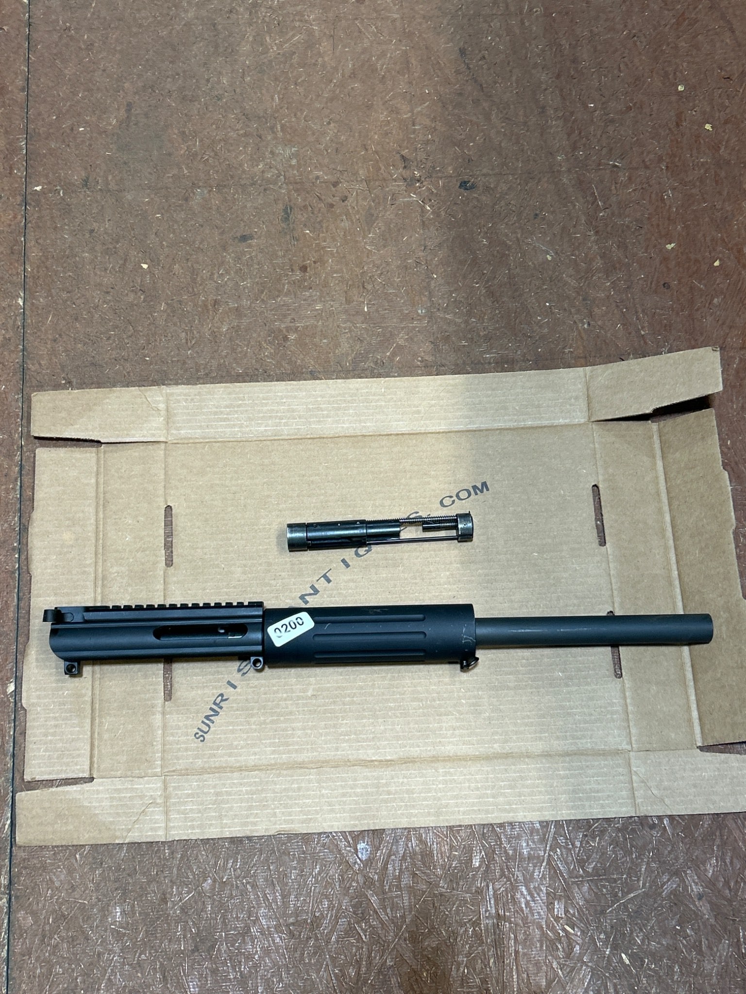 2-Piece Firearm Upper Receiver Set: Two-piece firearm upper receiver set, including one upper assembly and one bolt carrier group. Condition and specifications are not guaranteed. All items are sold AS IS, WHERE IS with no warranties or