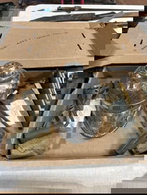 Metallic Helmet and Two Crank Tools