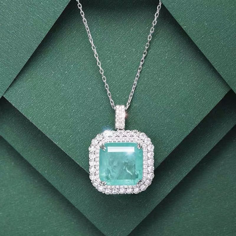 925 Silver Paraiba Pendant: 925 Silver Paraiba Pendant ****** Metal: 925 Silver / Main Stone: Paraiba / Color: Blue / Pendant Size: 20*30mm / Length : 45cm