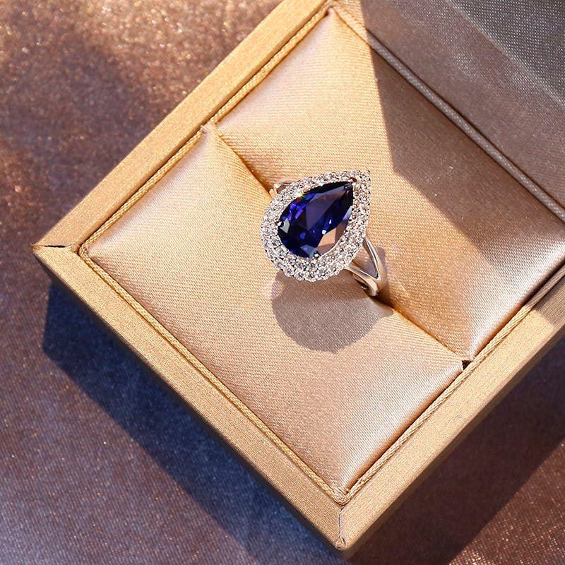 925 Silver Tanzanite Ring: 925 Silver Tanzanite Ring ****** Metal: 925 Silver / Main Stone: Tanzanite / Color: Blue / Size: 12*17mm / Diameter: 17mm