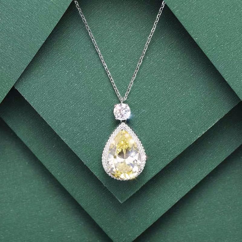 925 Silver Yellow Gem Necklace: 925 Silver Yellow Gem Necklace ****** Metal: 925 Silver / Main Stone: Yellow Gem / Color: Yellow / Pendant Size: 16*27mm / Length : 45cm