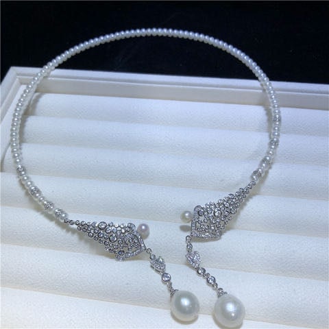 Natural Pearl Fashion Collar: Natural Pearl Fashion Collar ****** Metal: Natural Pearl / Color: White / Pearl Diameter 5mm, Pearl Diameter 14mm, Collar Length 45mm