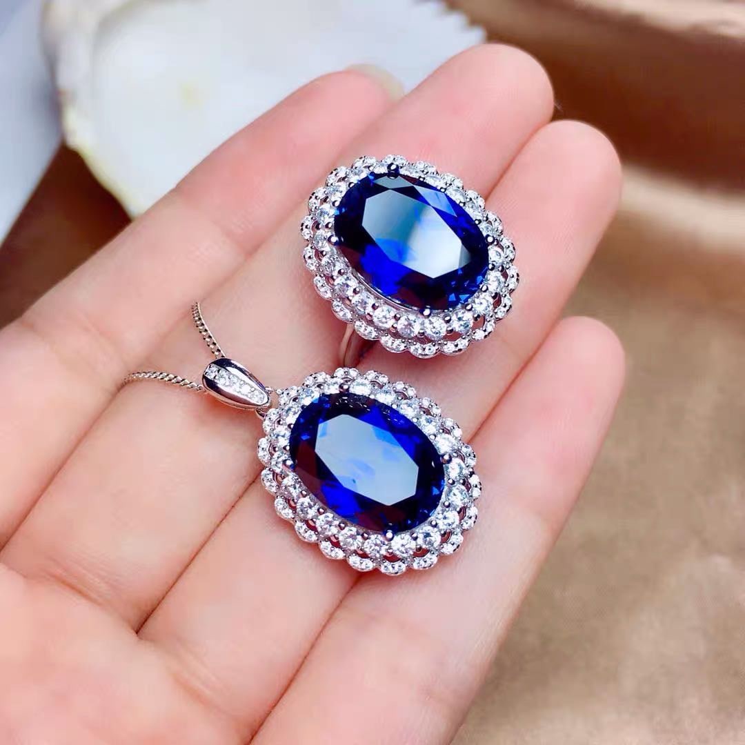 925 Silver Tanzanite Pendant and Ring Two-Piece Set: 925 Silver Tanzanite Pendant and Ring Two-Piece Set ****** Metal: 925 Silver / Main Stone: Tanzanite / Color: Blue / Main Stone Size: 10*14mm