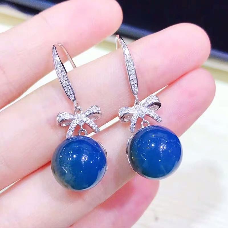 Dominican Blue Amber 925 Silver Earrings: Dominican Blue Amber 925 Silver Earrings ****** Metal: Dominican Amber / Color: Blue / Blue Amber Diameter 12mm