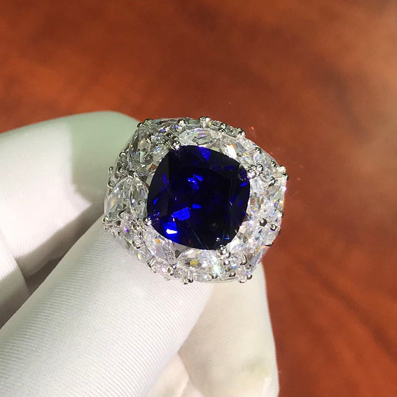 925 Silver 6ct Tanzanite Ring: 925 Silver 6ct Tanzanite Ring ****** Metal: 925 Silver / Main Stone: Tanzanite / Color: Blue / Carat Weight: 6 / Main Stone Size: 11*11mm / Size: 17*19mm