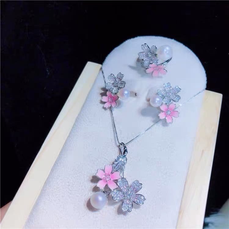 Natural Pearl 925 Silver Pendant Earrings and Ring Three-Piece Set: Natural Pearl 925 Silver Pendant Earrings and Ring Three-Piece Set ****** Metal: Natural Pearl / Color: White / Pearl Diameter 9mm