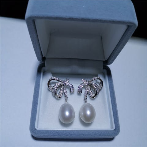 Natural Pearl 925 Silver Earrings: Natural Pearl 925 Silver Earrings ****** Metal: Natural Pearl / Color: White / Pearl Diameter 10mm