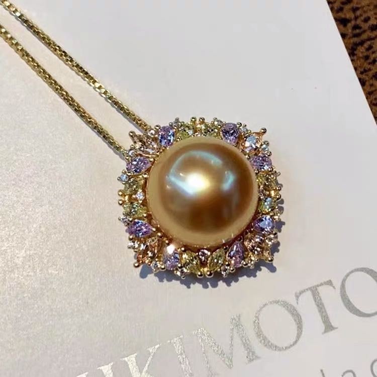 South Sea Golden Pearl 925 Silver Pendant: South Sea Golden Pearl 925 Silver Pendant ****** Metal: South Sea Pearl / Color: Golden / Pearl Diameter 13mm