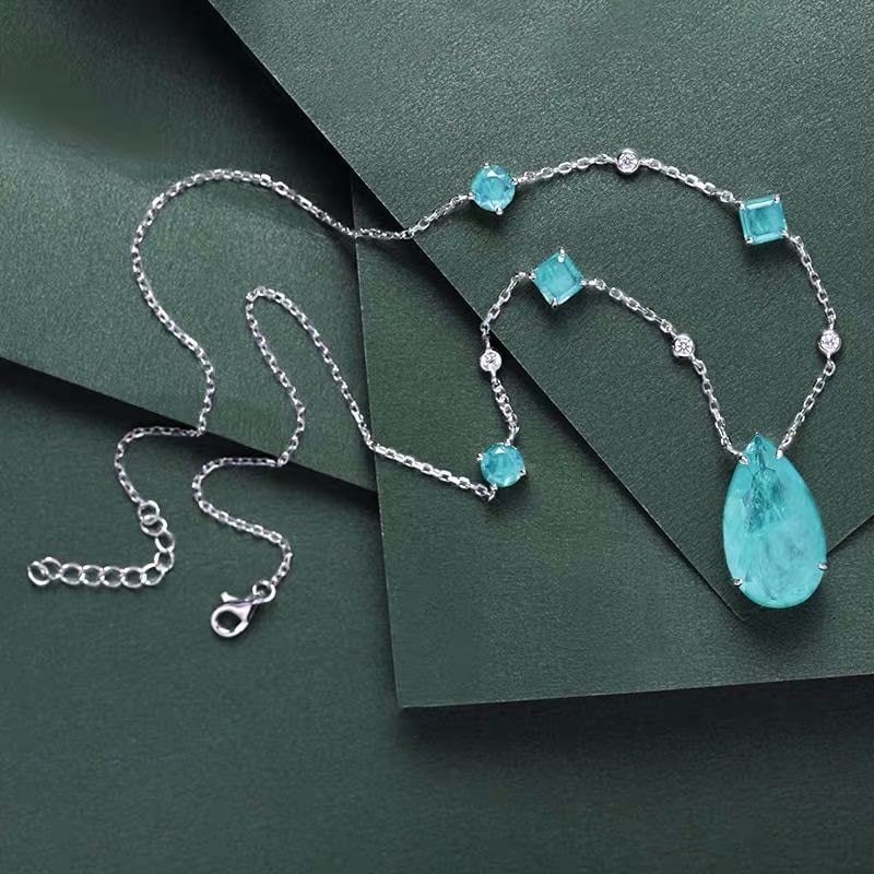 925 Silver Paraiba Necklace: 925 Silver Paraiba Necklace ****** Metal: 925 Silver / Main Stone: Paraiba / Color: Blue / Pendant Size: 14*24mm / Length : 45cm