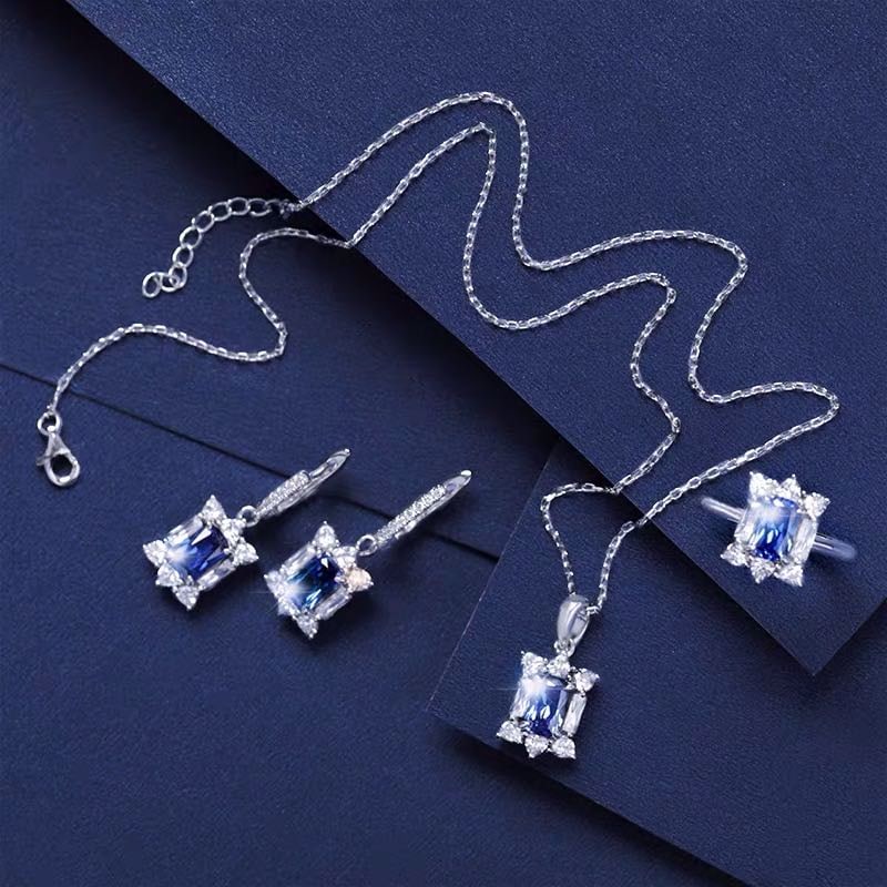 925 Silver Tanzanite Pendant Earrings and Ring Three-Piece Set: 925 Silver Tanzanite Pendant Earrings and Ring Three-Piece Set ****** Metal: 925 Silver / Main Stone: Tanzanite / Color: Blue / Pendant Size: 10*15mm / Length : 45cm / Earring Size: 10*30mm / Ring