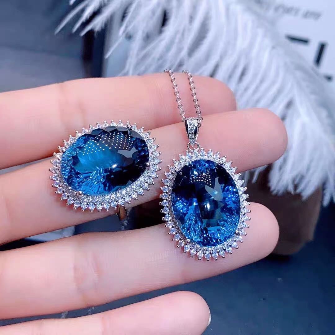 925 Silver London Topaz Pendant And Ring Two-Piece Set: 925 Silver London Topaz Pendant And Ring Two-Piece Set ****** Metal: 925 Silver / Main Stone: London Topaz / Color: Blue / Pendant Main Stone Size: 12*16mm / Ring Main Stone Size: 12*16mm